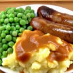 Bangers and Mash served with onion gravy